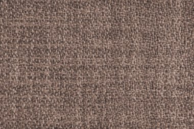 Döşeme kahverengi renkli Jacquard kumaş kabartma dokusu. Tekstil arka planı, mobilya tekstil malzemesi, duvar kağıdı, fon. Kumaş yapısı kapat, makro