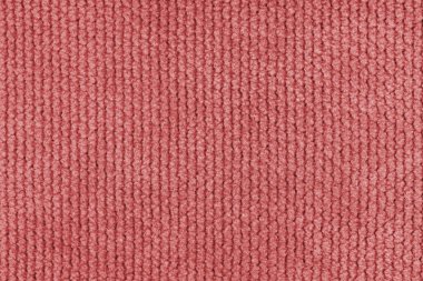 Kadife desenli kırmızı kumaş kabarık örgü yakın, makro örülmüş kabarık. Tekstil arka planı, mobilya tekstil malzemesi, duvar kağıdı, fon. Kumaş yapısı kapat, makro.