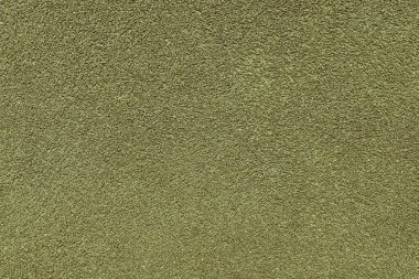 Asfalt, alçı, çimento, plastik, taş, taş, kapak, makro. Khaki renkli granüler duvar yüzeyinin arka planı, pürüzlü arkaplan