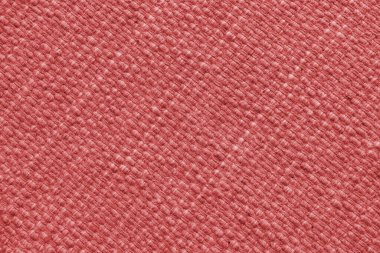 Büyük çapraz dokuması olan kırmızı doğal kumaş dokusu. Yüzey, döşeme ya da halı malzemesi yapısı, kumaş arka plan kapat.