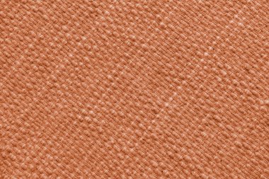 Büyük çapraz dokuması olan turuncu doğal kumaş dokusu. Yüzey, döşeme ya da halı malzemesi yapısı, kumaş arka plan kapat.