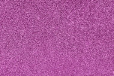 Asfalt, alçı, çimento, plastik, taş, taş, kapak, makro. Pembe granüler duvar yüzeyinin arka planı, pürüzlü arkaplan