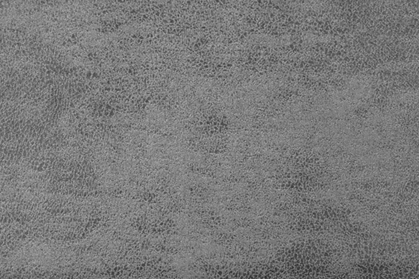 Soyut, pejmürde, kabartmalı gölgeli, gri süet kumaştan bir yapı, makro. Döşeme, dekoratif kumaş yapı, ev dekorasyonu için tuval. Arkaplan, arkaplan, duvar kağıdı.