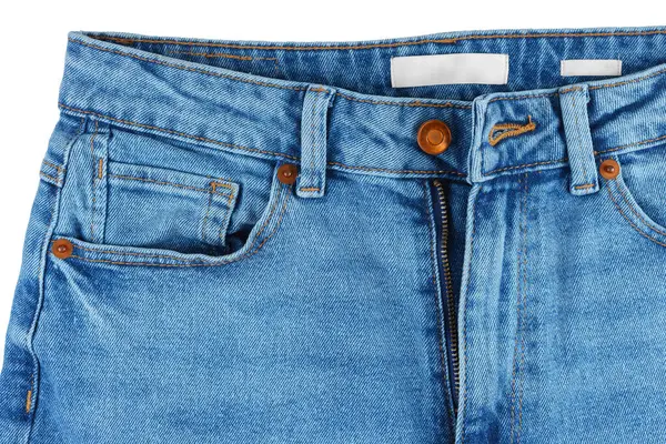 Kot pantolonun ön tarafı. Tasarım ayrıntıları, metal düğme, bel, cep ve küçük cep, makro. Duvar kağıdı, arka plan. Moda konsepti, günlük giyim, iş, alışveriş, satış