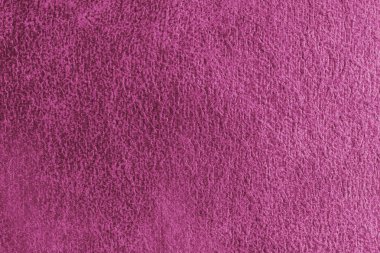 Yakın çekim, soyut kabartmalı, dağınık desenli pembe süet kumaşlı makro yapı. Döşeme, dekoratif kumaş yapı, ev dekorasyonu için tuval. Arkaplan, arkaplan, duvar kağıdı.