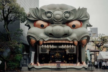 Namba Yasaka Jinja (Namba Yasaka Shrine). Small shrine featuring a ritualistic performance stage in the shape of a lion s head clipart