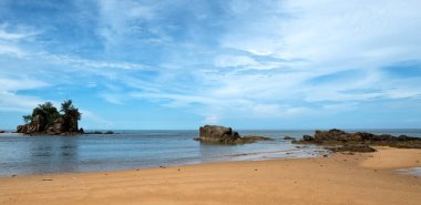 Tranquil Coastal View of Pantai Kuala Kemasik with Rocky Shoreline, Terengganu, Malaysia