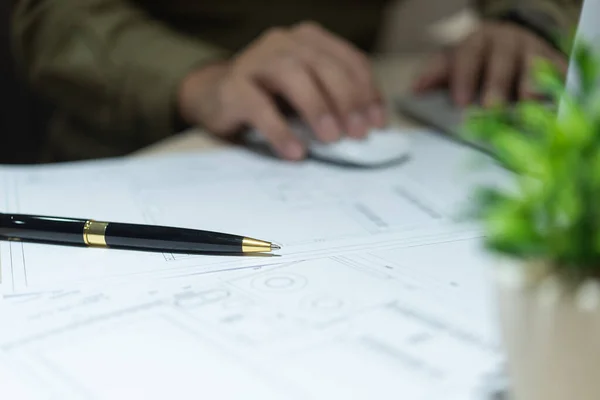 Pen on home interior design engineer document plan architectural. industrial drawing blueprint paper on desk.