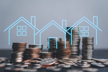Konut piyasası büyümesini dijital olarak üstüste koyan madeni para yığını. Yatırım, emlak finansmanı emlak işi kavramı.