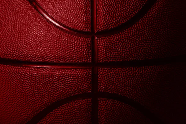 赤いバスケットボールボールの質感の背景の詳細を閉じます 水平スポーツのテーマのポスター グリーティングカード ヘッダー ウェブサイトとアプリ — ストック写真