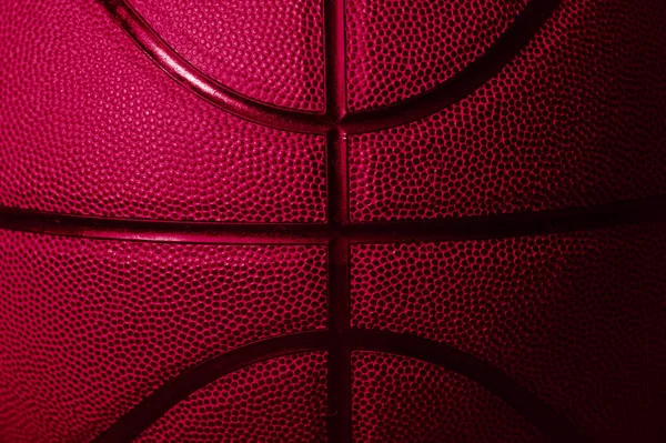 ピンクのバスケットボールボールの質感の背景の詳細を閉じます 水平スポーツのテーマのポスター グリーティングカード ヘッダー ウェブサイトとアプリ — ストック写真
