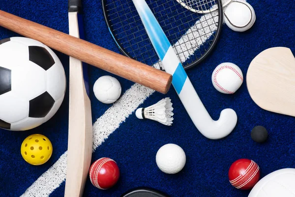 Sports equipment, rackets, bat and balls on blue sport background. Horizontal education and sport poster, greeting cards, headers, websit