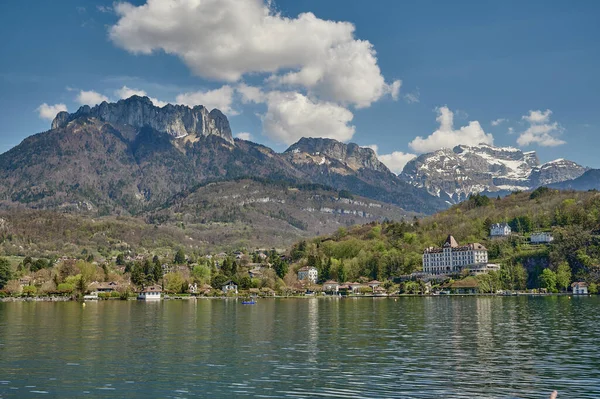 A landscape around Lake Annecy on a sunny day. Lake Annecy is a perialpine lake in Haute-Savoie in France.
