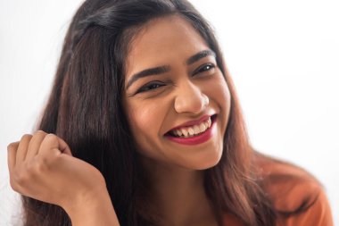 Close-up portrait of smiling woman with long black hair clipart