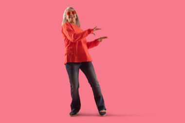 An old lady dancing being modishly dressed. clipart