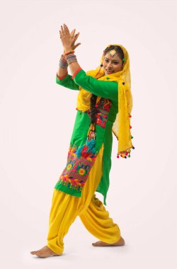 A Giddha dancer performing a dance step. clipart