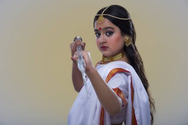 child dressed up as goddess durga clipart