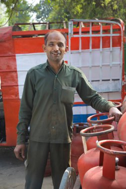 Man With Gas Cylinders clipart