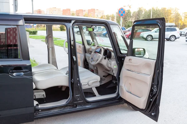 stock image Pavlodar, Kazakhstan - 08.03.2022: Honda N-Box kei car interior view through the opened doors.