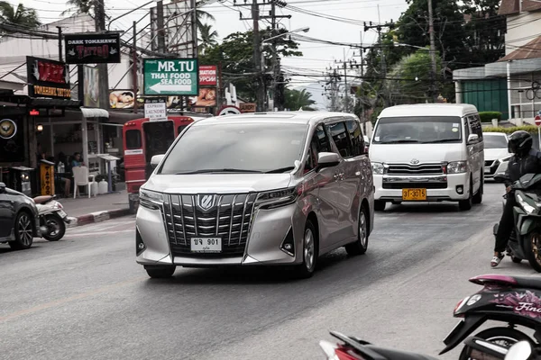 stock image Thailand, Patong - 03.27.23: Silver car model Toyota Alphard VAN body on the street.