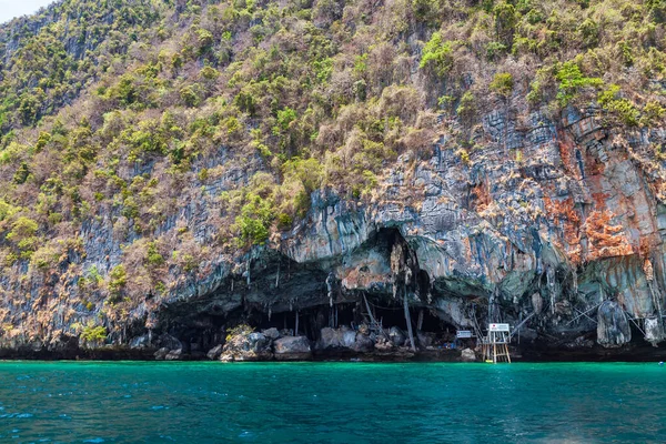 stock image Viking caves on Phi Phi Le island in the Andaman Sea with pirates hiding treasures. Travel and excursions in Thailand Phuket island.