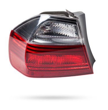 Bir Alman otomobil için kırmızı ve beyaz renkli optik ekipmanların izole edilmiş beyaz arka plan üzerindeki stop sinyalinin farları. Bir araba hizmet merkezinde tamir ve satış için yedek parça..