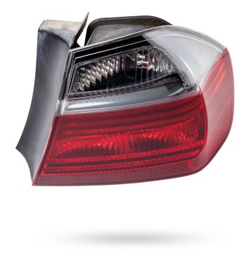 Bir Alman otomobil için kırmızı ve beyaz renkli optik ekipmanların izole edilmiş beyaz arka plan üzerindeki stop sinyalinin farları. Bir araba hizmet merkezinde tamir ve satış için yedek parça..