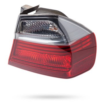 Bir Alman otomobil için kırmızı ve beyaz renkli optik ekipmanların izole edilmiş beyaz arka plan üzerindeki stop sinyalinin farları. Bir araba hizmet merkezinde tamir ve satış için yedek parça..