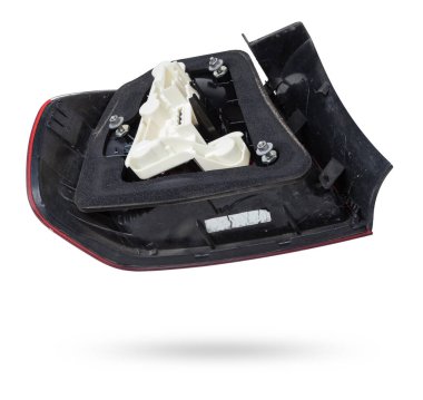 Bir Alman otomobil için kırmızı ve beyaz renkli optik ekipmanların izole edilmiş beyaz arka plan üzerindeki stop sinyalinin farları. Bir araba hizmet merkezinde tamir ve satış için yedek parça..