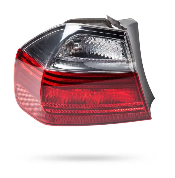 Bir Alman otomobil için kırmızı ve beyaz renkli optik ekipmanların izole edilmiş beyaz arka plan üzerindeki stop sinyalinin farları. Bir araba hizmet merkezinde tamir ve satış için yedek parça..