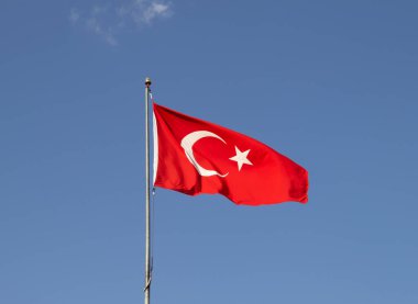 Turkish flag waving in a clear sky. red white and crescent and star national flag