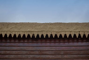 earthen roof and edge decorations of an old wooden house. turkish and ottoman style.