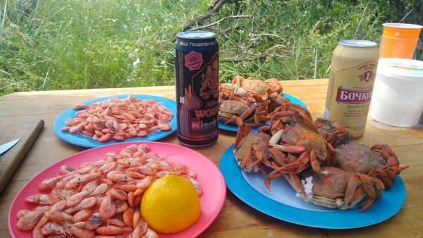 Boiled crabs shrimps on the table Ukraine