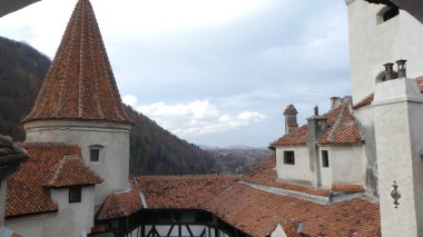 Tile roofs, mountains, valley, Dracula's castle, Romania