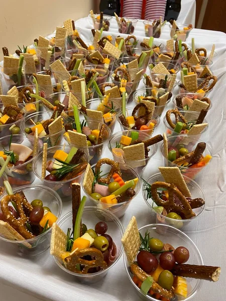 Mini appetizers in a plastic cups 