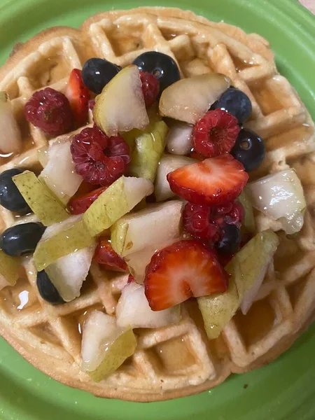 Delicious breakfast pancakes with fruit 