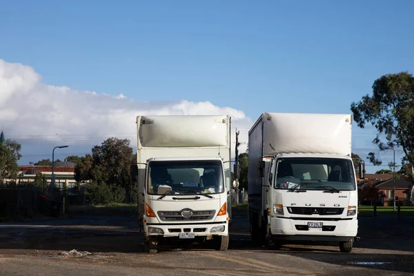 Two White Loading Trucks Parked Gravel Surface — Stock Photo, Image