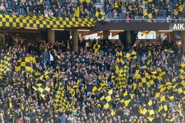 SOLNA, SWEDEN - 16 APR 2023: Tifo ve taraftarları Solna 'daki Friends Arena' da AIK vs Hammarby IF maçında. Nihai sonuç 2-0