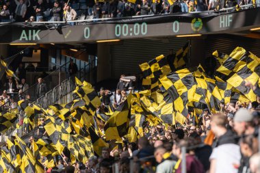 SOLNA, SWEDEN - 16 APR 2023: Tifo ve taraftarları Solna 'daki Friends Arena' da AIK vs Hammarby IF maçında. Nihai sonuç 2-0