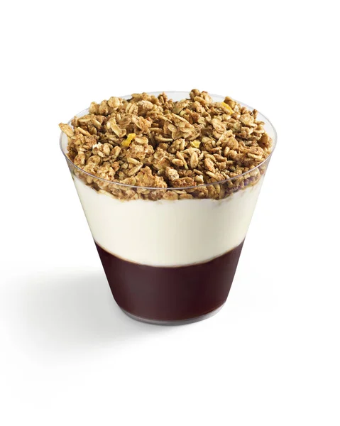 Üstünde krema ve granola olan ferahlatıcı bir smoothie. Kahvaltı ya da tatlı için lezzetli ve sağlıklı bir seçenek..