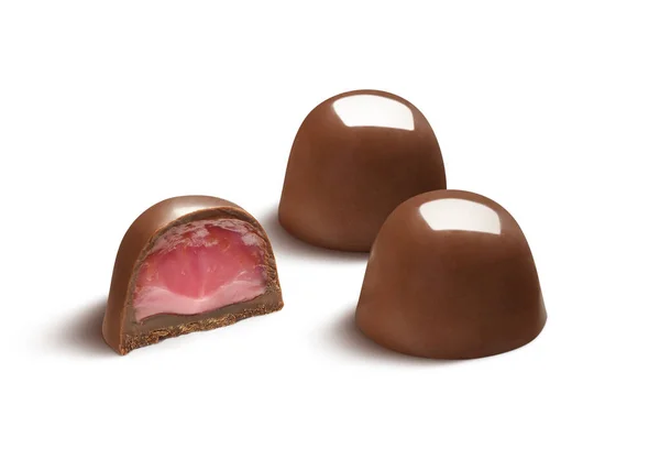 İki lezzetli çikolatalı bonbon. Yarısı meyveli, yalıtılmış.