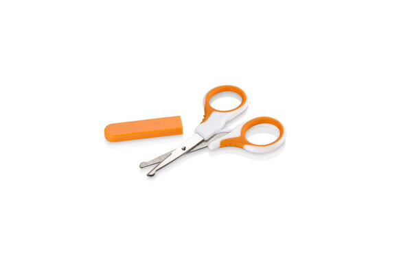 Orange and white nail scissors without safety cap isolated