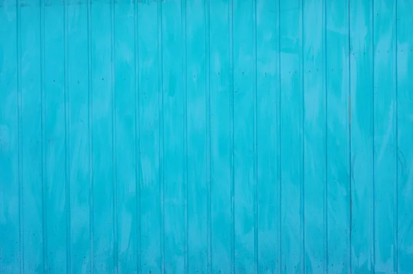 wooden wall paneling background painted cyan blue