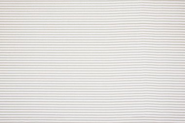 Yatay dalgalı çizgileri olan beyaz alçı duvar arkaplanı