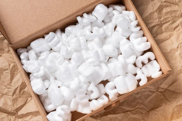 White Packaging Chips, Styrofoam peanut in cardboard box