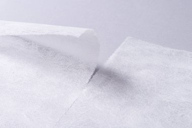 Non woven material, covering roll for medical bed