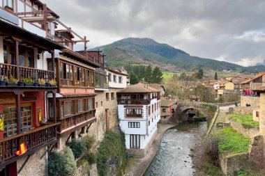 Urban scene of the Cantabrian town of Potes, in the Picos de Europa National Park. High quality photo clipart
