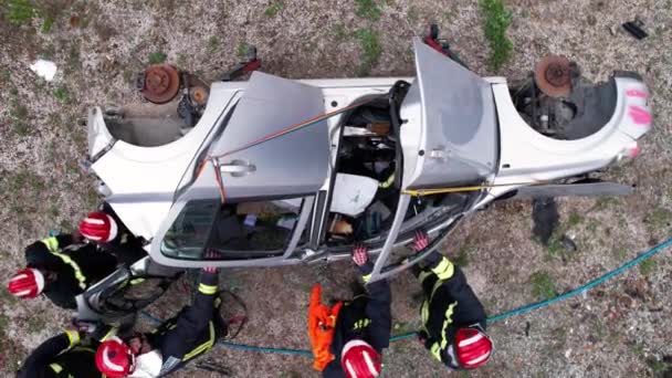 Aerial View Car Crash Traffic Accident Firefighters Rescue Injured Trapped — Stock Video