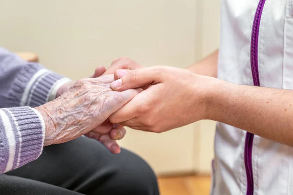 Close Senior Woman Hand Her Caregiver Helping Hands Holding Together — Stock Photo, Image