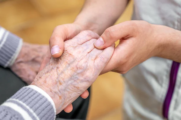 Close Senior Woman Hand Her Caregiver Helping Hands Holding Together Royalty Free Stock Photos